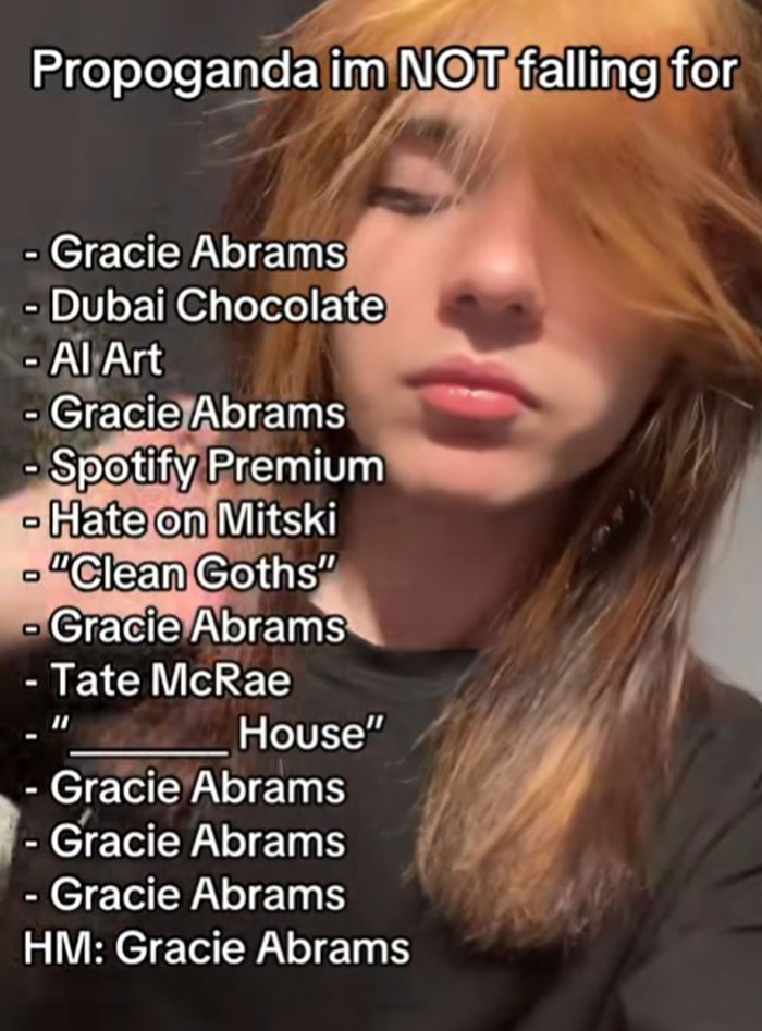 Young person with orange hair listing propaganda they refuse to fall for, emphasizing Gracie Abrams repeatedly.
