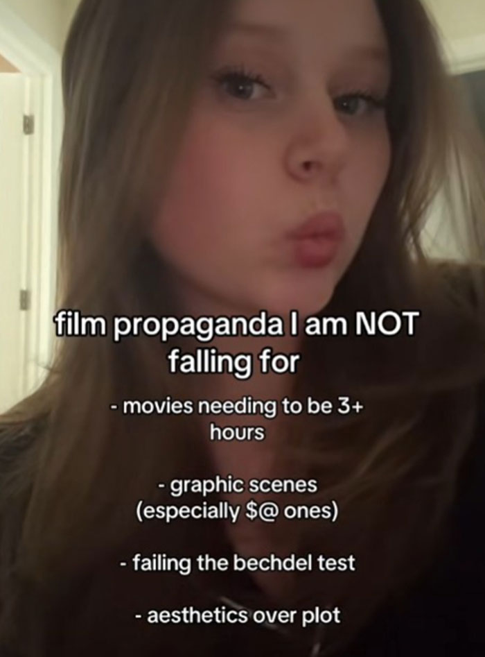 Young woman sharing thoughts on film propaganda she refuses to fall for, listing common movie critiques and preferences.