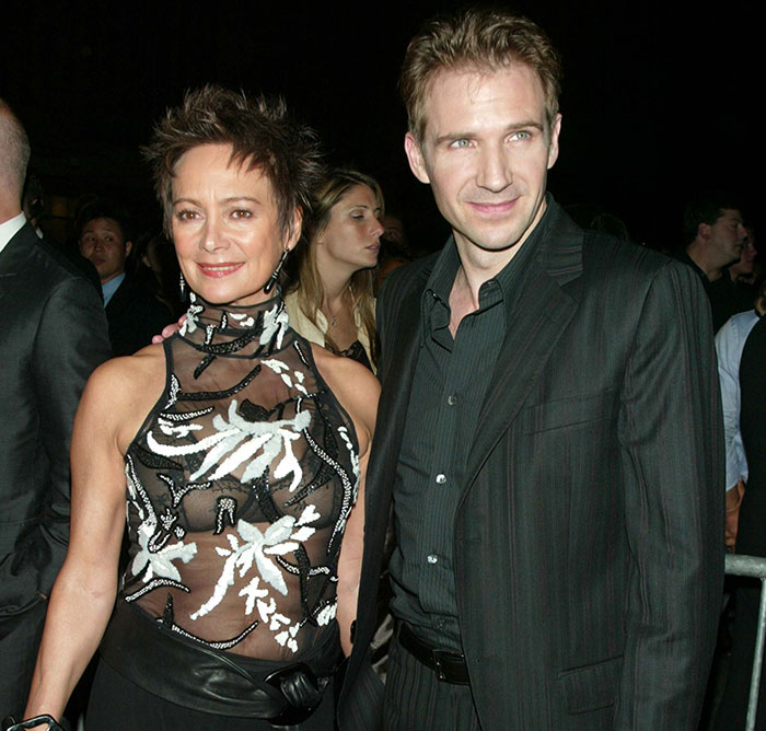 Ralph Fiennes and Francesca Annis posing together at an event, reuniting after a scandalous affair years ago