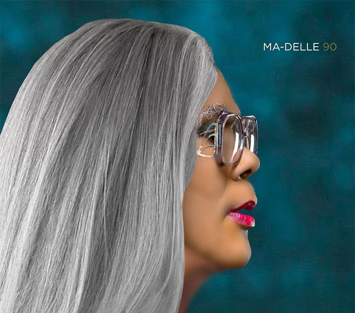 Profile of a woman with long gray hair and glasses, representing the richest actor in the world 2025.