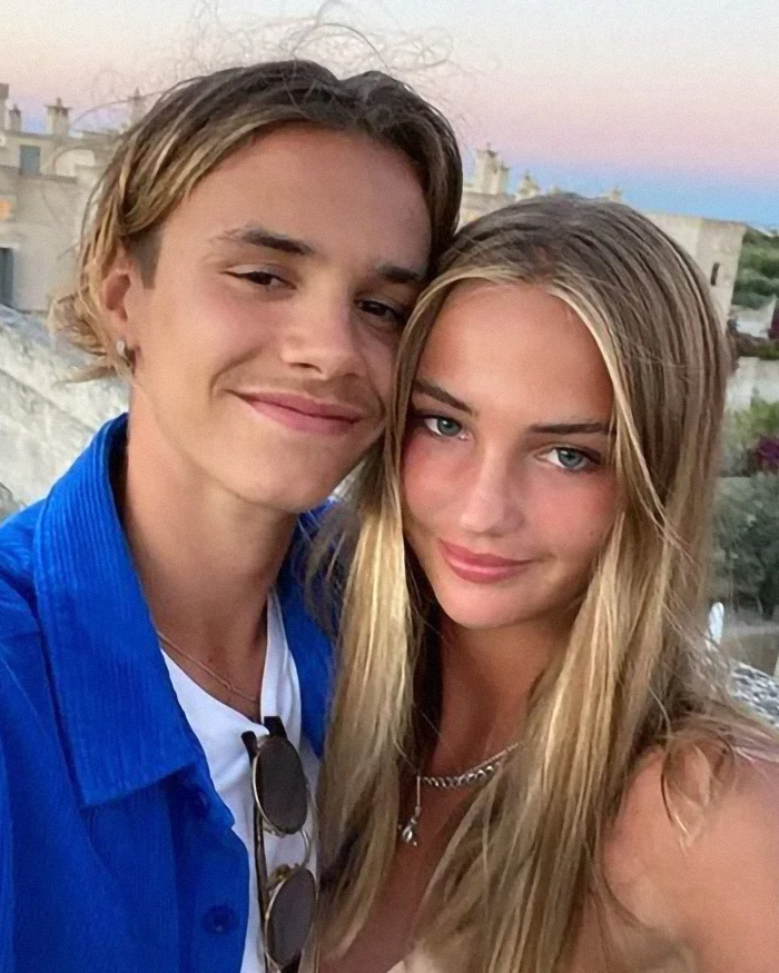 Romeo and Cruz Beckham smiling together outdoors in casual clothes amid family drama on Instagram.