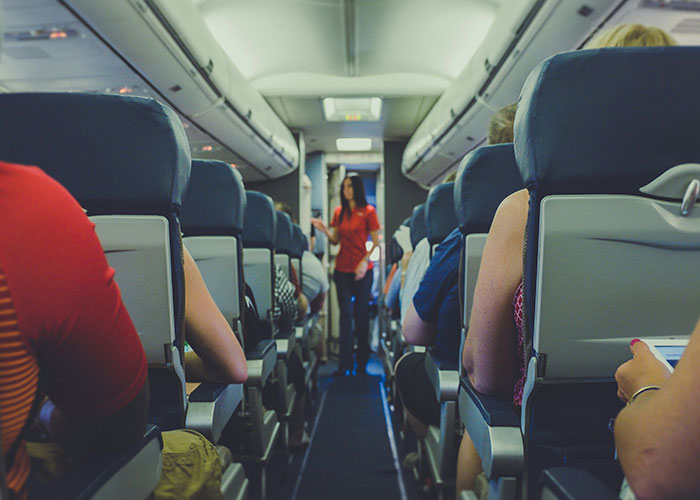 Woman thinks she&rsquo;s right to complain about plane passenger during flight, facing unexpected consequences inside airplane cabin.