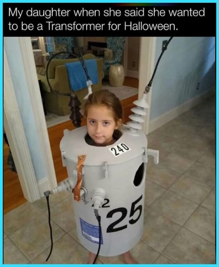 Young girl in a homemade transformer costume standing indoors, showcasing one of the hilariously sarcastic memes.