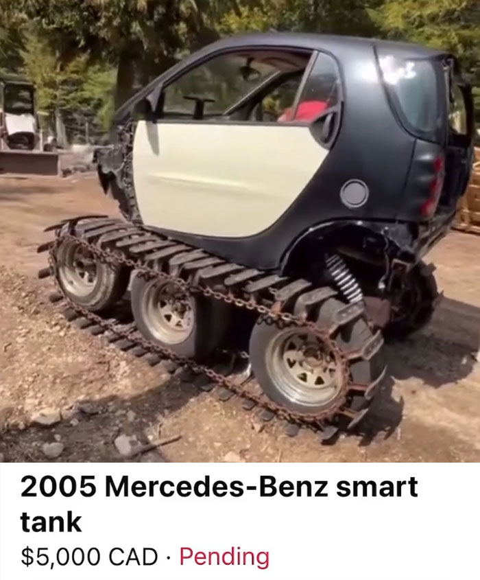 2005 Mercedes-Benz smart car modified with tank tracks spotted for sale in a chaotic car listing.