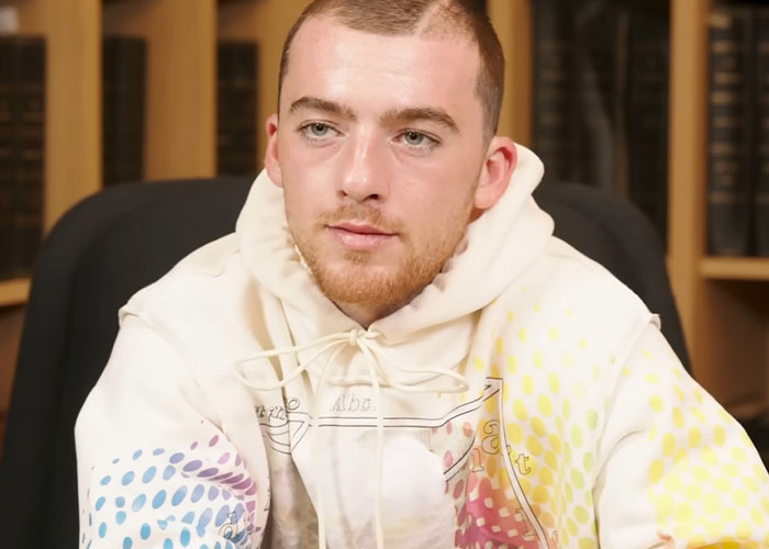 Young man sharing insights in an interview, highlighting stories from people who knew celebrities before fame.