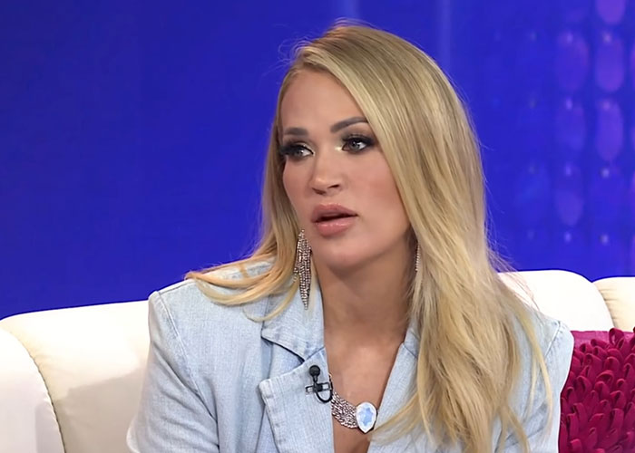 Woman sharing stories about people who knew celebrities before fame in a studio interview setting with purple background.