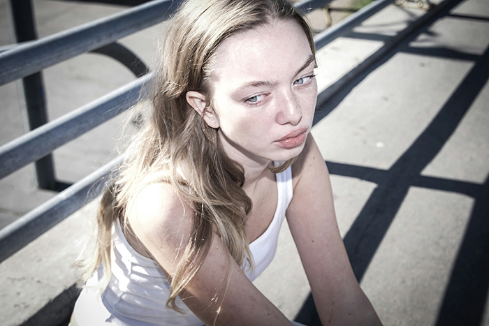 Woman looking upset and shocked outdoors after almost getting scammed at the store, learning a tough lesson. Woman looking upset and shocked outdoors after almost getting scammed at the store, learning a tough lesson.