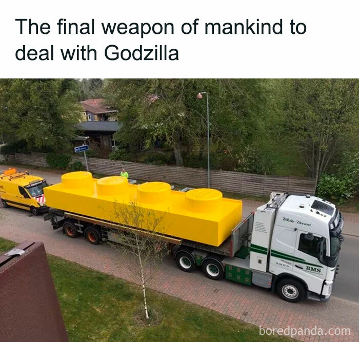 Large yellow Lego brick being transported on a truck, a random meme for when your brain needs a break.