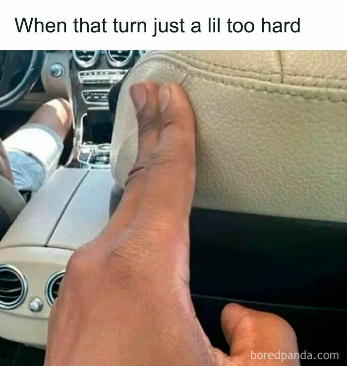 Foot pressing hard against car seat back, humorously capturing a relatable human experience meme.
