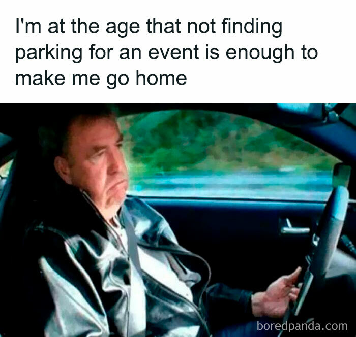 Middle-aged man in a car looking disappointed about not finding parking, reflecting human experience in memes.