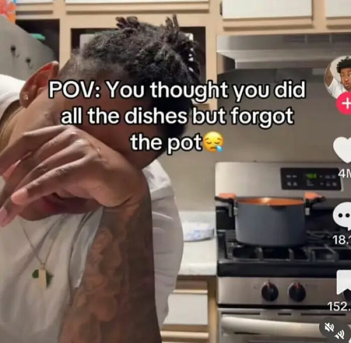Person wiping face in kitchen, meme about forgetting to wash the pot, highlighting relatable human experience memes.