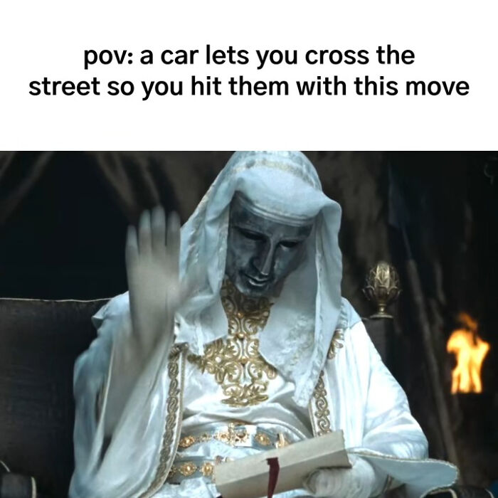 Person in ornate medieval white and gold robe raising hand, illustrating a meme about the human experience and social interactions.