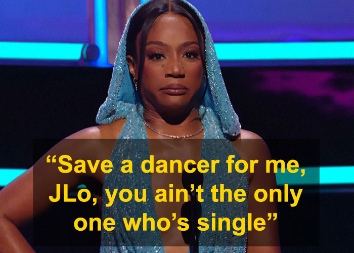 Comedian delivering a witty roast with a single line about Jennifer Lopez during a TV awards show segment.