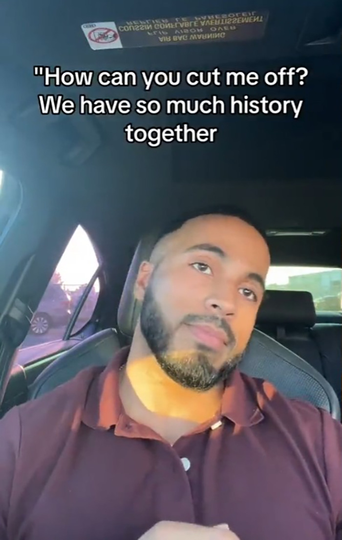 Man with beard sitting in a car, appearing thoughtful, with text about cutting off history, toddler covered in blood mentioned.