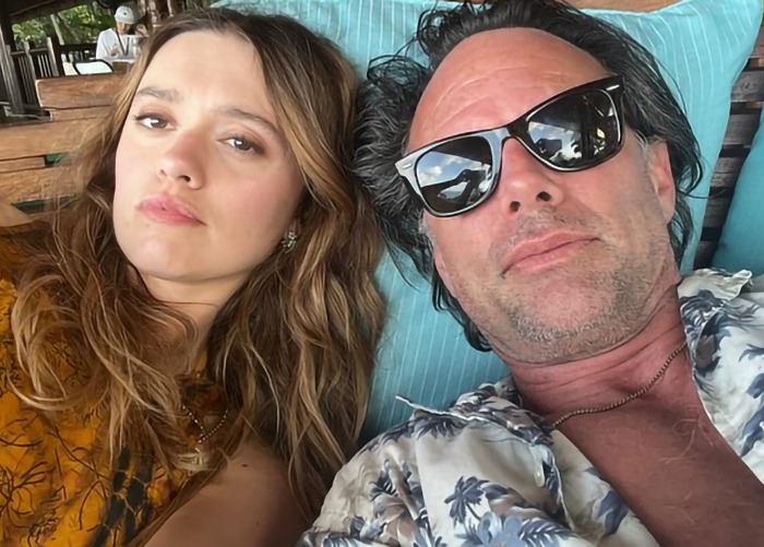 Walton Goggins and Aimee Lou Wood in a casual selfie, Walton Goggins reacts strongly to feud questions in interview.