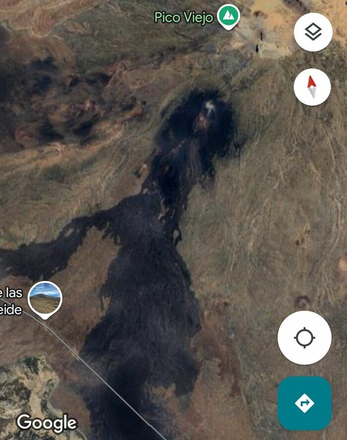 Satellite view of an unusual dark formation near Pico Viejo, an odd discovery shared on Google Earth.