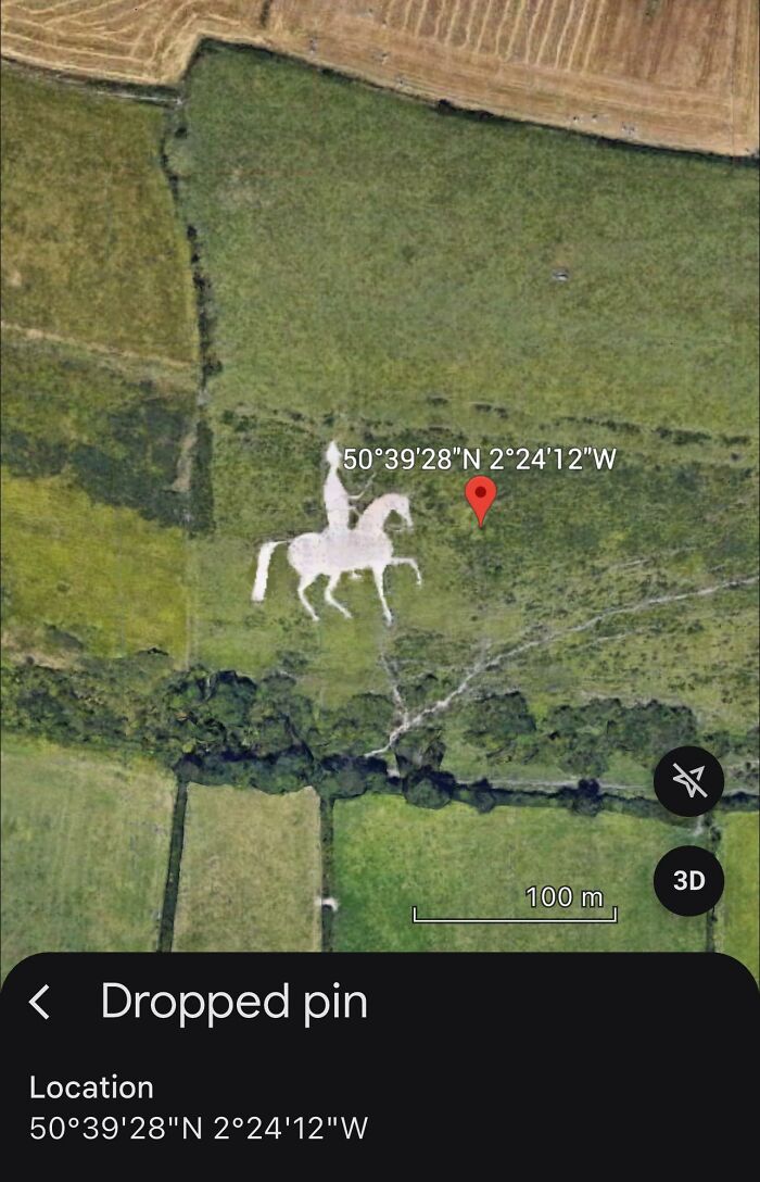 Aerial view of an odd horse and rider figure carved into the landscape captured on Google Earth.