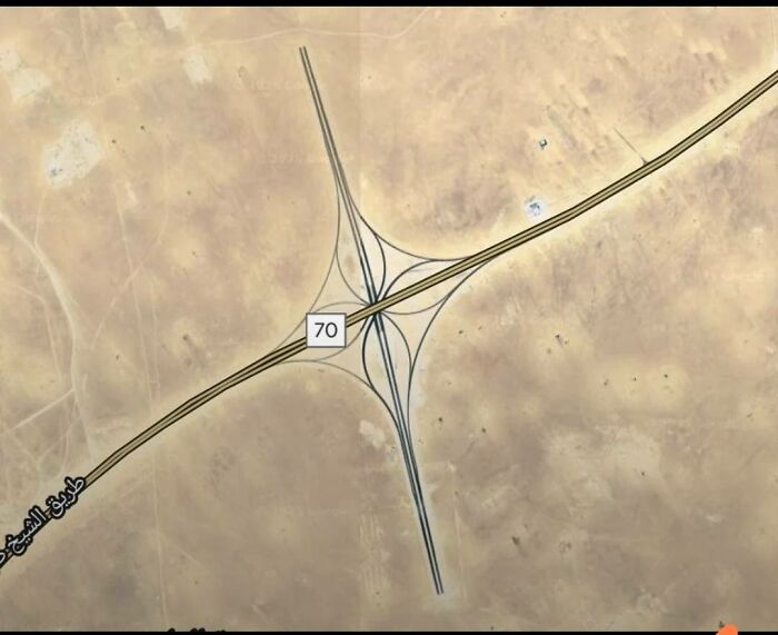 Aerial view of a desert highway interchange showing odd road patterns found on Google Earth.