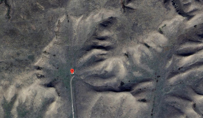 Aerial view of rocky terrain with unusual land formations captured on Google Earth showing weird things.