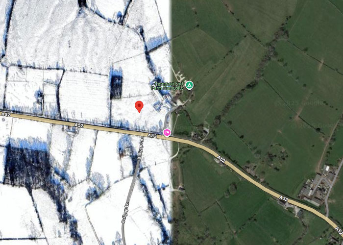 Satellite view showing an unusual sharp boundary between snowy and green fields, a weird thing on Google Earth.