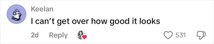 Comment by a user named Keelan praising a woman who challenges beauty stereotypes with a stache, expressing admiration for the look.