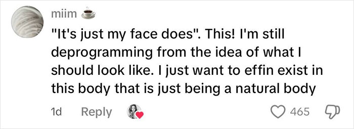 Woman challenges beauty stereotypes with natural facial hair, confidently embracing her stache and redefining norms.