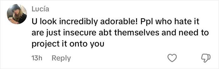 Comment by Lucia praising a woman who challenges beauty stereotypes with a stache, emphasizing confidence and self-love.