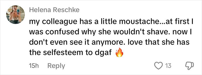 Comment praising a woman who challenges beauty stereotypes by confidently embracing her natural mustache.