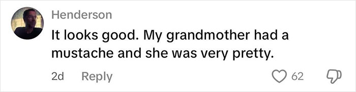 Comment text on a social media post showing support as a woman challenges beauty stereotypes including a mustache.