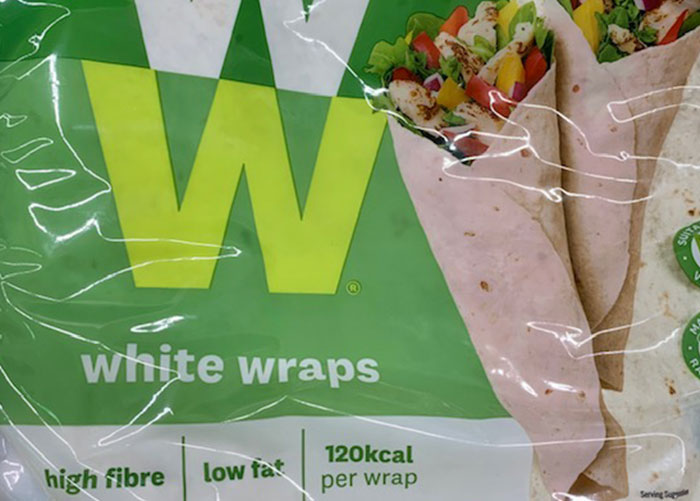 Package of white wraps with vegetables inside, illustrating one of the worst gifts people have ever received.