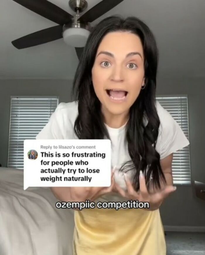 Woman discussing weight loss and Ozempic competition, expressing frustration about natural weight loss efforts online. Woman discussing weight loss and Ozempic competition, expressing frustration about natural weight loss efforts online.