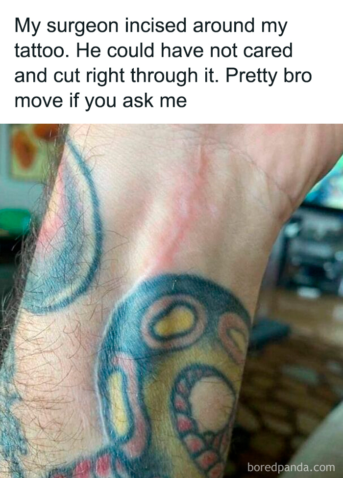 Close-up of a wrist with a tattoo and a healing surgical scar incised around it, showcasing a feel-good act of care.