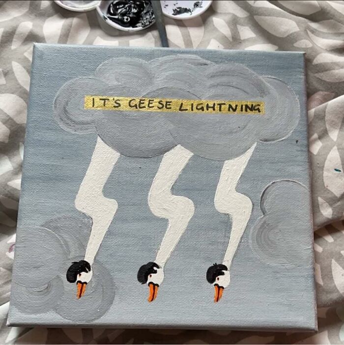 Painting of clouds with lightning bolts shaped like geese heads, showcasing a humorous and horrible craft attempt.