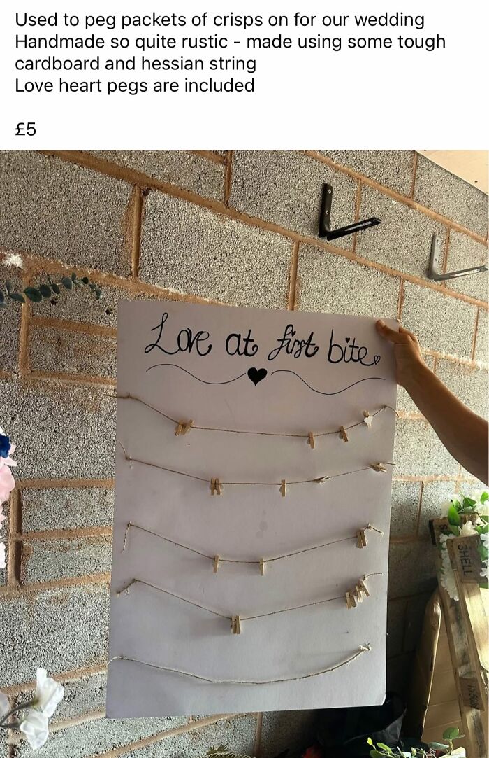 Rustic handmade DIY project display board with string and small pegs for hanging packets, showcasing craft shaming fails.