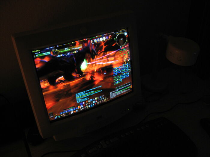 Old computer monitor displaying a dark, fiery game scene illustrating secrets people keep from their lovers.