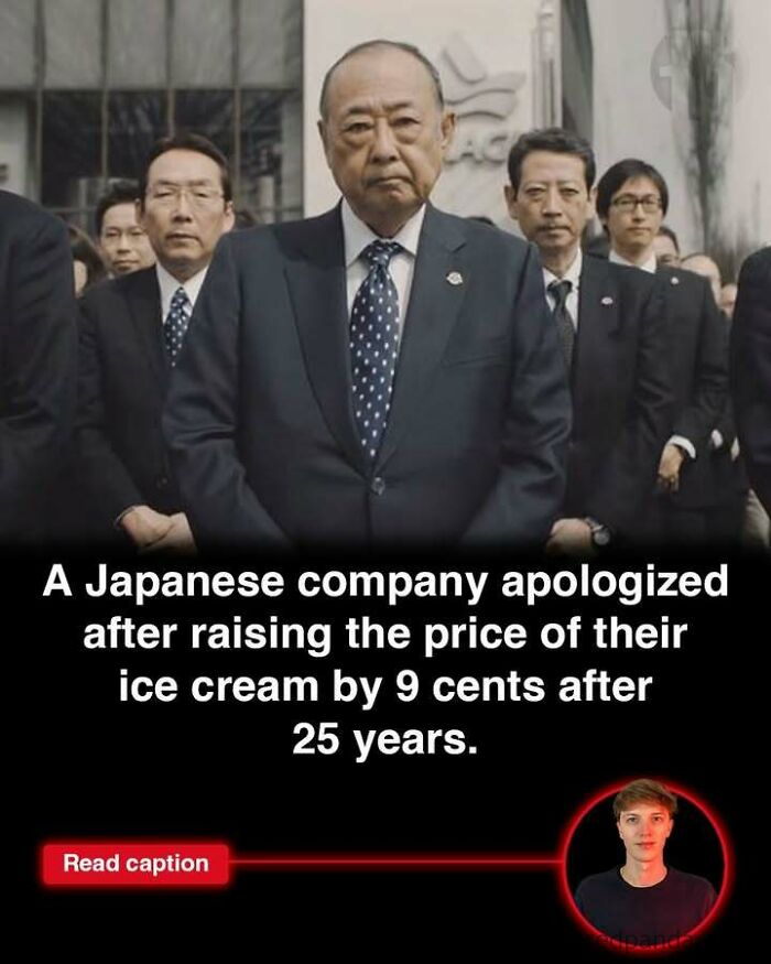 Group of serious Japanese businessmen in suits standing together, highlighting interesting stories happening in the world.