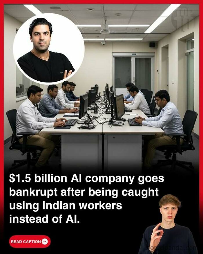 Office workers using computers in an AI company scandal involving Indian workers instead of artificial intelligence.