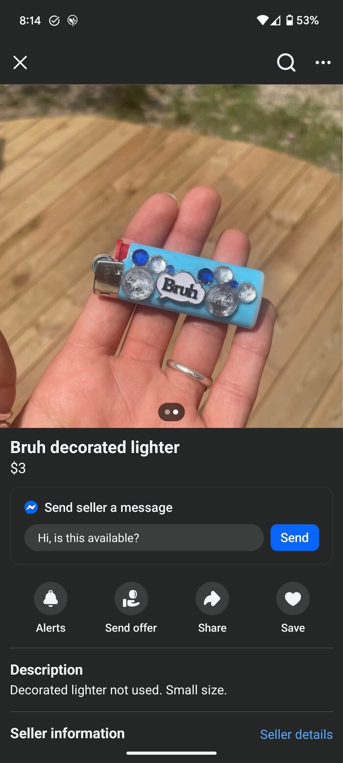 Hand holding a craft shaming DIY decorated lighter with blue and silver embellishments and the word bruh on it.