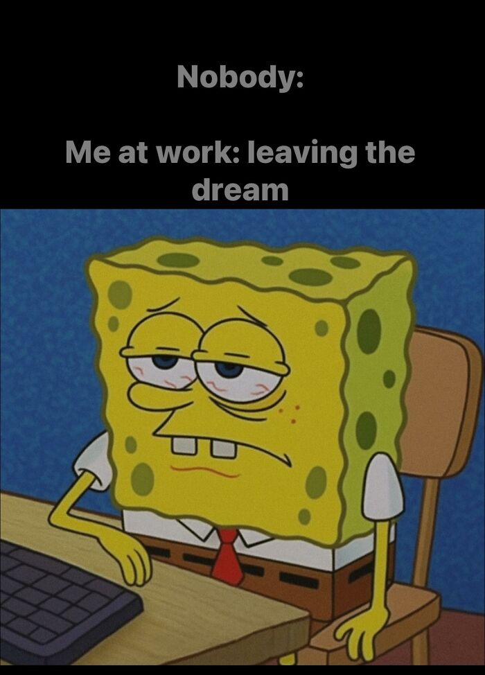 Tired SpongeBob meme sitting at a desk, representing funny work memes about struggling to stay motivated at work.