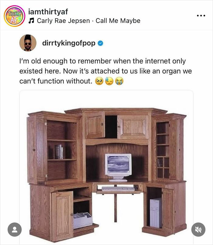 Screenshot of a social media post about internet dependency with an image of a vintage wooden computer desk.