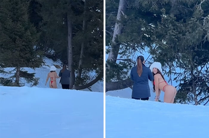 Influencer wearing minimal clothing in snow next to a person in winter coat, highlighting unhinged influencer behavior for views.