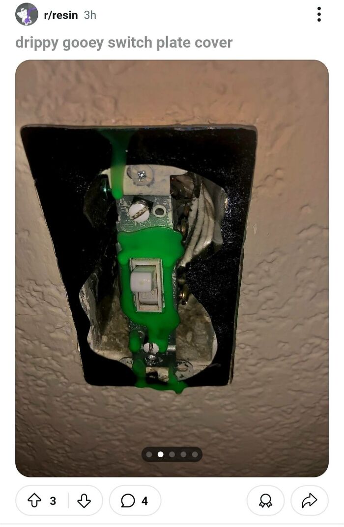 Switch plate cover with green gooey resin dripping down the electrical switch, showcasing a horrible craft fail by netizens.