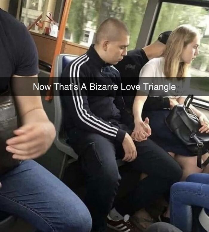 Three people sitting on a bus with two holding hands and one hand reaching in, a funny post from viral internet humor.
