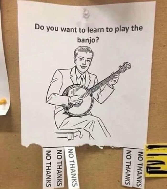 Funny sign asking if you want to learn to play the banjo with tear-off tabs saying no thanks, adding chaos to the world.