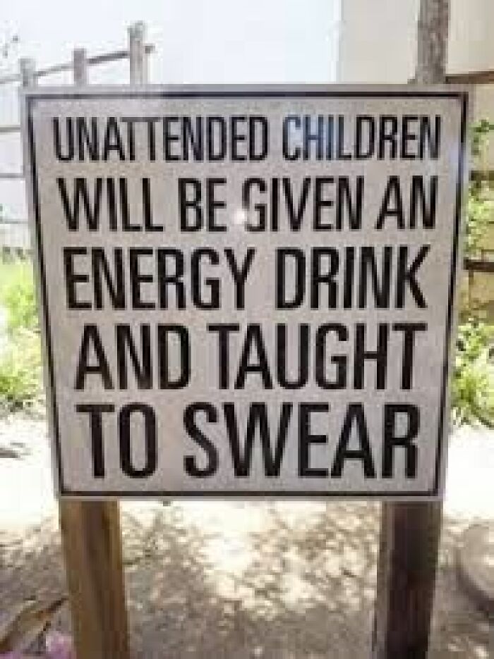 Funny sign warning unattended children will be given an energy drink and taught to swear, adding chaos to the world.