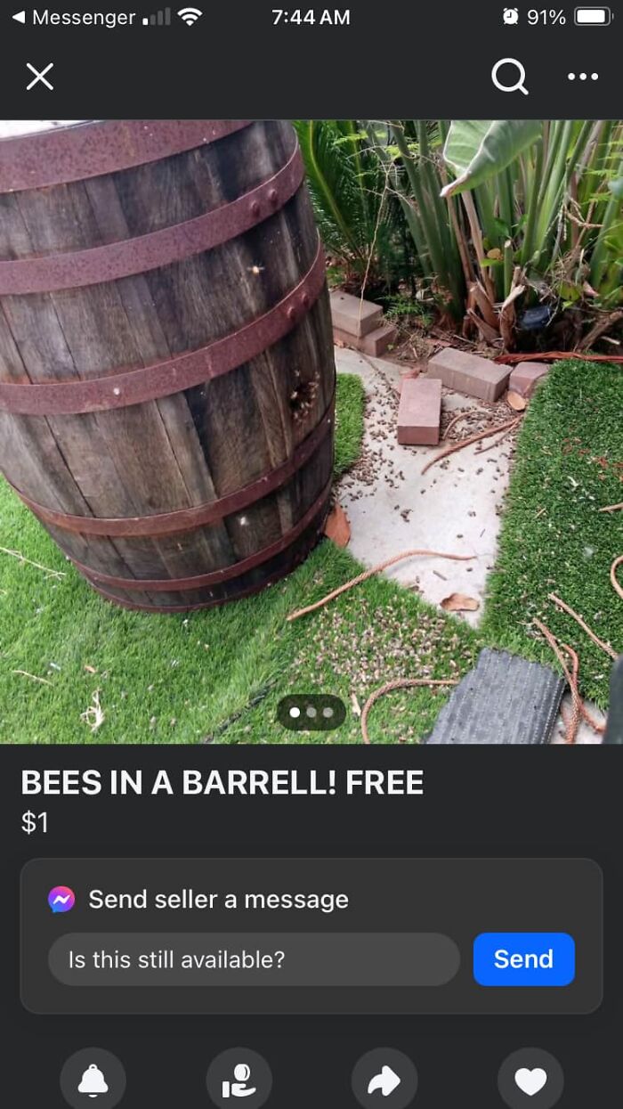 A wooden barrel leaning on artificial grass with bees swarming around, an example of horrendous DIY craft shaming.