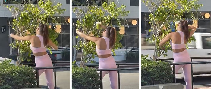 Woman in pink outfit drinking from and throwing a cup outdoors, illustrating unhinged influencers doing crazy things for views.
