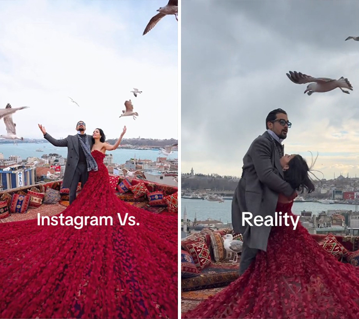 Couple in a red dress and coat posing on a rooftop overlooking a city, showcasing Instagram vs reality travel moments.