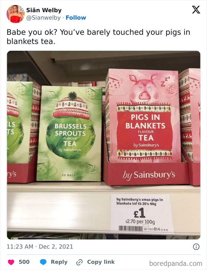 Boxes of pigs in blankets and brussels sprouts flavored tea by Sainsbury’s on a store shelf, unusual gross foods displayed.