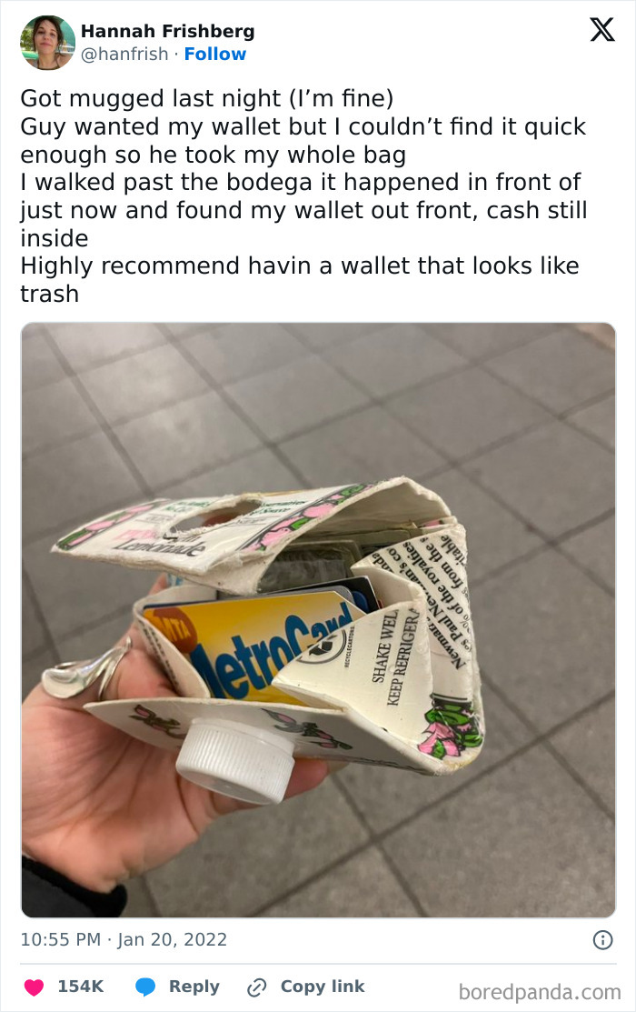 Hand holding a DIY wallet made from folded paper carton, featuring creative and unhinged DIY projects concept.